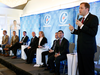 Conservative leadership candidates at a debate on Nov. 13. Brad Trost, standing, says “it’s for the membership to decide” what level of French is needed.