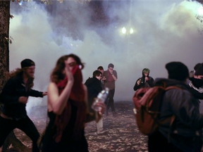 Police in downtown Portland, Ore., attempt to disperse people protesting the election of President-elect, Donald Trump, Friday, Nov. 11, 2016.