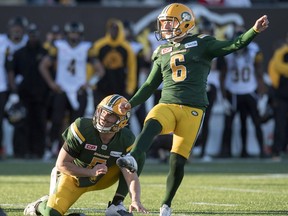 Edmonton Eskimos kicker Sean Whyte (6) and quarterback Jordan Lynch watch Whyte's game-winning field goal against the Hamilton Tiger-Cats on Nov. 13.