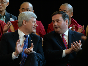 Stephen Harper speaks with Jason Kenney as he makes a campaign stop in Markham, Ontario, on Monday, August 10, 2015.