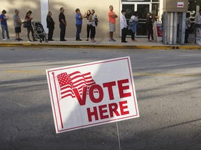 Voters line up at polling stations in Florida
