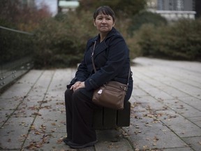 Caseworker for Public Safety and Solicitor General Victim Services and Crime Prevention Unit, Freda Ens, poses for a photograph in downtown Vancouver on Friday, Oct. 28, 2016.