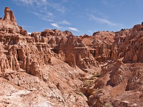 Cathedral Gorge is known for dramatic erosion patterns carved in soft bentonite clay.