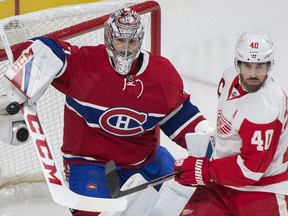 Canadiens goaltender Carey Price makes a save with Detroit Red Wings' Henrik Zetterberg on his doorstep during second period NHL hockey action in Montreal on Saturday night.