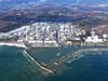 This aerial photo shows Fukushima Dai-ichi nuclear power plant in Okuma, Fukushima Prefecture, following a strong earthquake hit off the coast of Fukushima, northern Japan, Tuesday, Nov. 22, 2016.