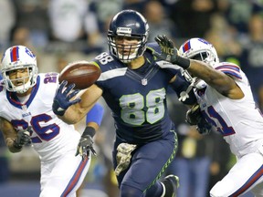 Tight-end Jimmy Graham of the Seattle Seahawks hauls in a one-handed reception for a touchdown during the Monday night NFL game in Seattle. Graham had a pair of TD receptions in Seattle's 31-25 victory over the Buffalo Bills.