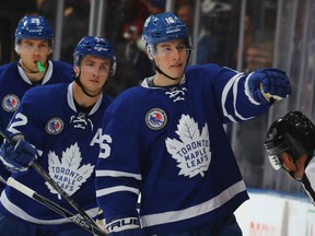Toronto Maple Leafs' Mitch Marner is congratulated after scoring a powerplay in the third period of Friday's NHL game against the Philadelphia Flyers at the Air Canada Centre. The Leafs scored four unanswered goals in the final period en route to a 6-3 victory.