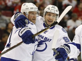 Tampa Bay Lightning centre Steven Stamkos, left, celebrates his goal against the Detroit Red Wings with Nikita Kucherov on Nov. 15.