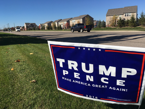 Much of Macomb County boasts wide roads, locally assembled trucks and suburban homes peppered with Trump signs.