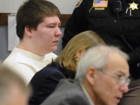 In this Jan. 19, 2010 file photo, Brendan Dassey, left, listens to testimony at the Manitowoc County Courthouse in Manitowoc, Wis. Dassey, whose homicide conviction was overturned in a case profiled in the Netflix series "Making a Murderer" was ordered released Monday, Nov. 14, 2016, from federal prison while prosecutors appeal. A higher court has now ordered he stay in prison.