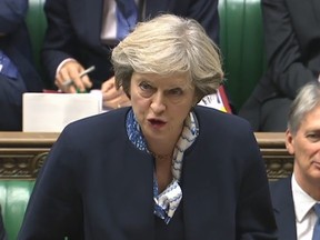 British Prime Minister Theresa May speaks in the House of Commons on Oct. 12.