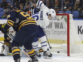 Mitchell Marner of the Toronto Maple Leafs scores one of his two goals on the night in a 2-1 victory over the Buffalo Sabres in NHL action Thursday night in Buffalo.