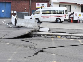 Fissures run along a road by the Centre Port in Wellington, Monday, November 14, after a major earthquake struck New Zealand's south Island early Monday.