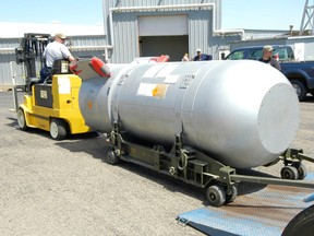 Workers move a B53 bomb at the Pantex Plant in Amarillo, Texas, in this undated photo.