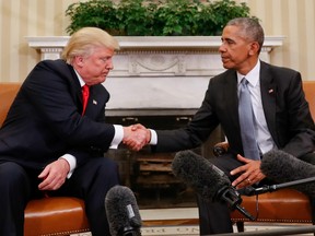 President Barack Obama and President-elect Donald Trump shake hands following their meeting in the Oval Office of the White House in Washington, Thursday, Nov. 10, 2016.