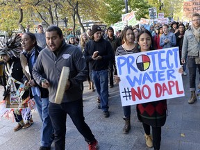 Protesters march in Salt Lake City in support of the Standing Rock Sioux against the Dakota Access Pipeline Monday, Oct. 31, 2016