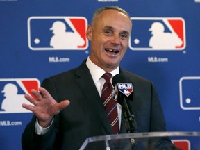 Negotiators for baseball players and owners, including Commissioner Rob Manfred, reached an agreement on a collective bargaining agreement to replace the five-year contract that expired Thursday.