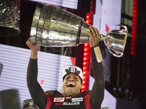 Ottawa Redblacks quarterback Henry Burris celebrates after his team defeated the Calgary Stampeders 39-33 to win the 104th Grey Cup at Toronto's BMO Field on Nov. 27.