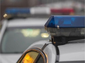 Police cruisers in Montreal Tuesday, December 22, 2015.