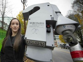 B.C. Hydro's Mora Scott shows one of the new meter's Hydro  has installed in it's new technology that's reduced power theft by grow ops by 80 per cent.