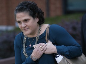 In this Tuesday, Nov. 1, 2016, file photo, University of Virginia administrator Nicole Eramo leaves federal court after closing arguments in her defamation lawsuit against Rolling Stone magazine in Charlottesville, Va. Jurors awarded Eramo $3 million Monday for her portrayal in a now-discredited Rolling Stone magazine article about the school’s handling of a brutal gang rape a fraternity house.