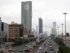 Traffic moves down the King Fahd highway in Riyadh: Saudi Arabia is the only country that forbids women to drive.