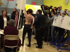 A New York polling station was disrupted by topless protesters