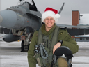 Capt. Thomas McQueen, pictured in front of his CF-18 in an RCAF photo from December, 2014