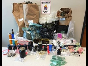 A cornucopia of drugs were seized from a Hamilton home in May. It was not until recently police learned one of the dark glass vials contained liquid fentanyl, a first in Canada