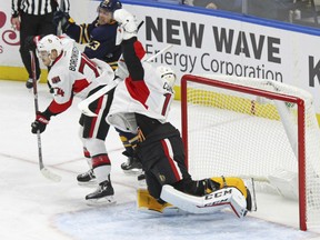 Ottawa Senators goalie Mike Condon makes a glove save during the third period against the Sabres on Wednesday night in Buffalo night. The Senators won 2-1 in a shootout.