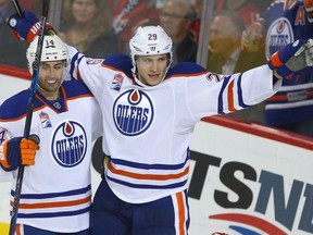 Edmonton Oilers centre Leon Draisaitl (right) celebrates a goal against the Calgary Flames with teammate Jordan Eberle on Oct. 14.