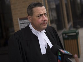 Defence attorney, Daniel Topp, speaks to the media about his client, James Leo Ryckman, outside the Superior Court of Justice, Friday, April 29, 2016.