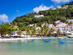 With its clear turqoUise waters and lush hillsides, Labrelotte Bay is one of the most scenic spots on St. Lucia.