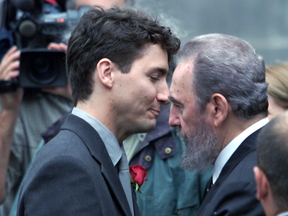 Justin Trudeau gets a hug from Cuban President Fidel Castro prior to the funeral of Pierre Trudeau in Montreal, Oct. 3, 2000.