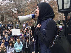 In this Wednesday, Nov. 9, 2016 file photo, Eeman Abbasi speaks during a protest on the University of Connecticut campus against the election of Republican Donald Trump as president in Storrs, Conn.