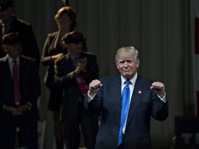 Donald Trump, 2016 Republican presidential nominee, gestures after speaking at a campaign rally in Selma, North Carolina, U.S., on Thursday, Nov. 3, 2016. Five days from the U.S. presidential election, polls released Thursday showed the race narrowing, with Democrat Hillary Clinton holding on to a slim lead over Trump.