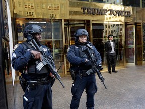 New York City police officers guard the front of Trump Tower in New York, Nov. 11, 2016.
