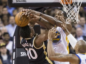 Toronto Raptors guard DeMar DeRozan gets fouled big time by Golden State Warriors forward Kevin Durant in Toronto on Wednesday. The Warriors rolled over the Raptors on Drake night, 127-121.