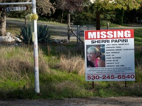In this Nov. 10, 2016 file photo, a "missing" sign for Mountain Gate, Calif., resident Sherri Papini, 34, is placed along side Sunrise Drive, near the location where the mom of two is believed to have gone missing while on a afternoon jog on Nov. 2.