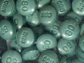 Calgary Police Guns & Gangs Unit displays fentanyl pills on Tuesday December 15, 2015.