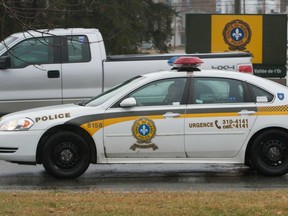 A Sûreté du Québec cruiser enters the police force's detachment in  in Val d'Or north of Montreal Wednesday, October 28, 2015.