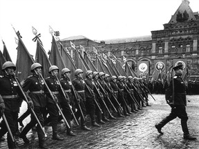 A file picture taken on June on 24, 1945 shows Soviet soldiers marching with Red Army colours during a Victory parade marking Nazi Germany 's defeat at the Red Square in Moscow. Russia celebrates the 1945 Soviet victory over Nazi Germany on May 9, the date of the Nazis' capitulation to the Soviet Union.