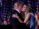 Republican president-elect Donald Trump and his daughter Ivanka Trump embrace after delivering his acceptance speech at the New York Hilton Midtown in the early morning hours of November 9, 2016 in New York City