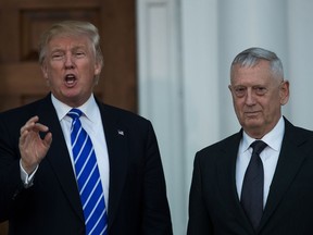 Donald Trump and Mattis after their meeting at Trump International Golf Club, November 19, 2016. Mattis will be the first career officer to lead the Pentagon since just after World War II.