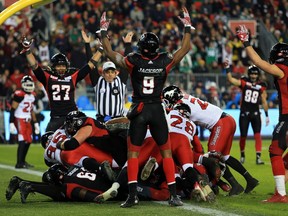 Ottawa Redblacks quarterback Henry Burris scores a touchdown against the Calgary Stampeders during the Grey Cup on Nov. 27.