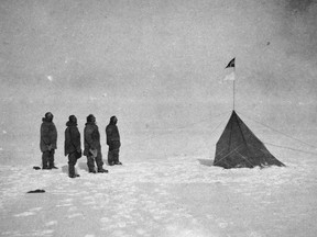 Roald Amundsen and his men pose at the South Pole on December 14, 1911.