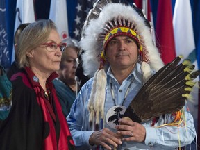 Assembly of First Nations Chief Perry Bellegarde speaks with Indigenous and Northern Affairs Minister Carolyn Bennett before the start of the Assembly of First Nations Special Chiefs assembly in Gatineau, Quebec on Tuesday December 6.