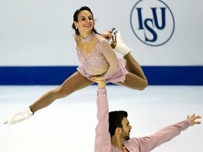 In this December 2016 file photo, Canada's Meagan Duhamel and Eric Radford compete during the pairs short program at the ISU Grand Prix of Figure Skating Final, in Marseille, France.