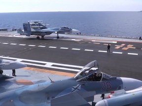 Jets on the deck of the Admiral Kuznetsov aircraft carrier in the eastern Mediterranean off the Syrian coast.