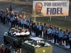 The motorcade carrying the ashes of the late Cuban leader Fidel Castro makes i's final journey towards the Santa Ifigenia cemetery in Santiago, Cuba Sunday, Dec. 4, 2016